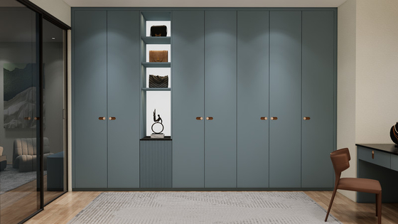 Blue Grey Custom Walk In Closet With Multi Drawer Island And Black Mirrored Vanity
